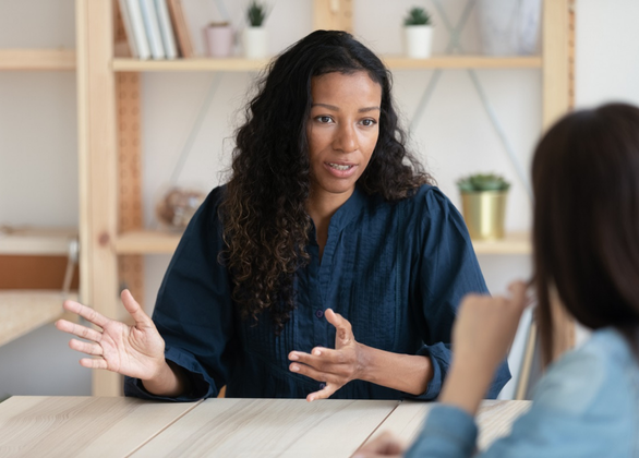 Closeup of two women speaking