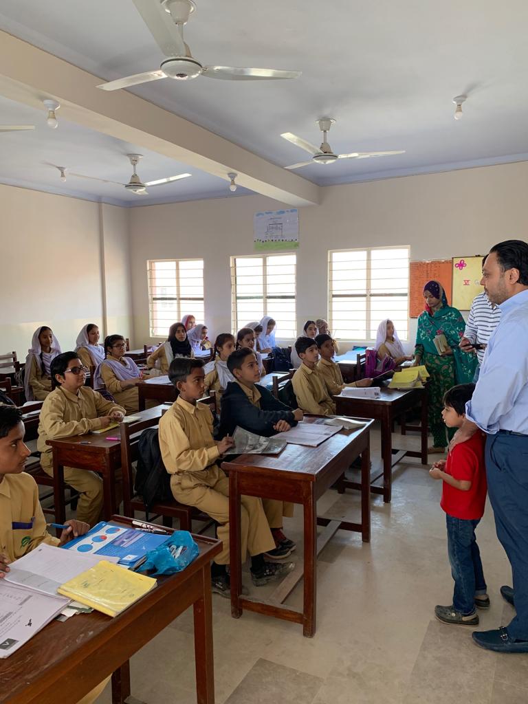 Shezad Habib visits classroom with students