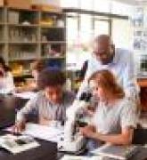 teacher and students in science classroom