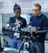Female and male engineer working on a project